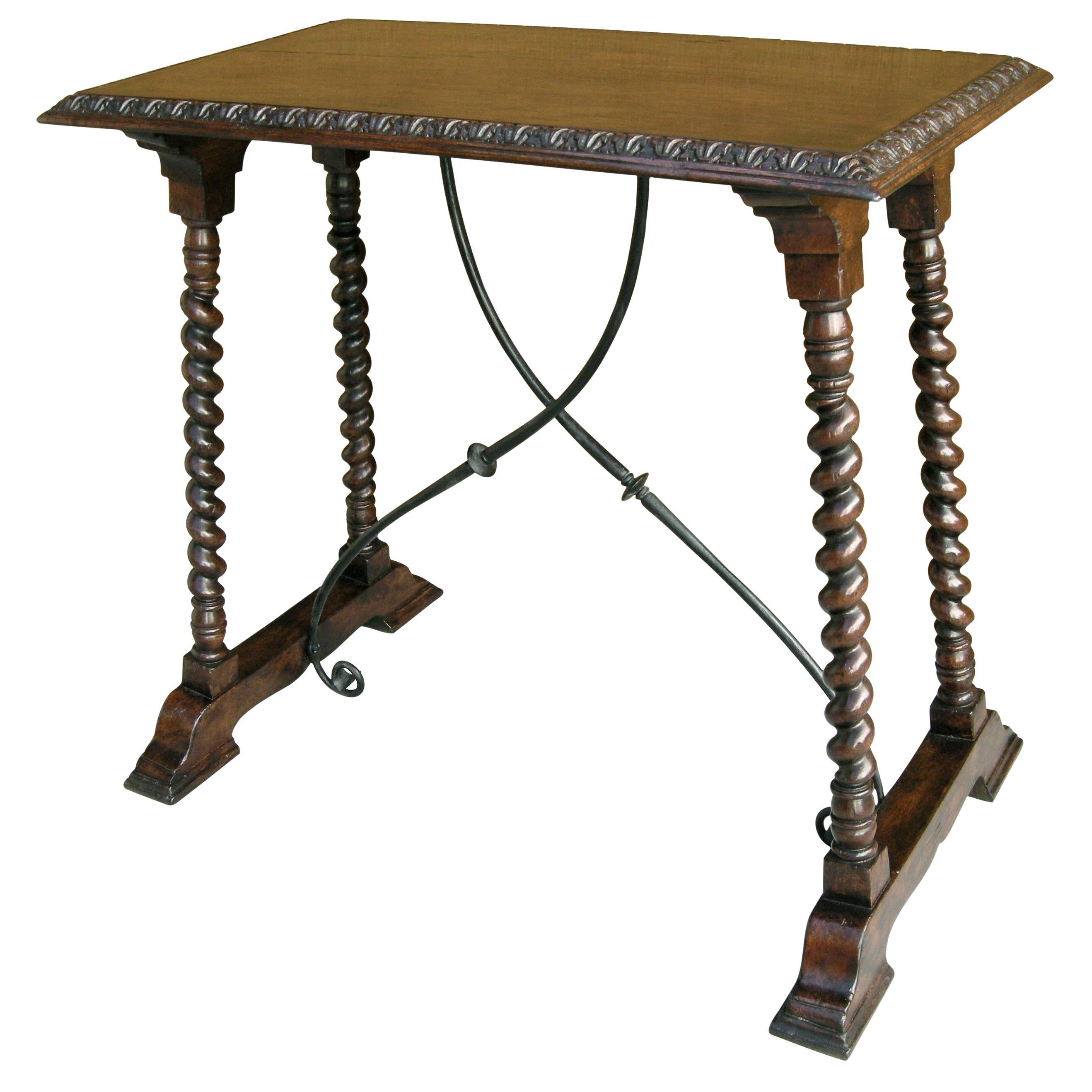 Carved Italian walnut and wrought iron Sorrento side table by Randy Esada

Item #: 9029 - Sorrento side table
Finish: Distressed dark walnut and aged iron
Dimensions: Top 32 W x 18.5 D
Base 34 W x 21 D x 30.5 H
2 in stock, quantity order