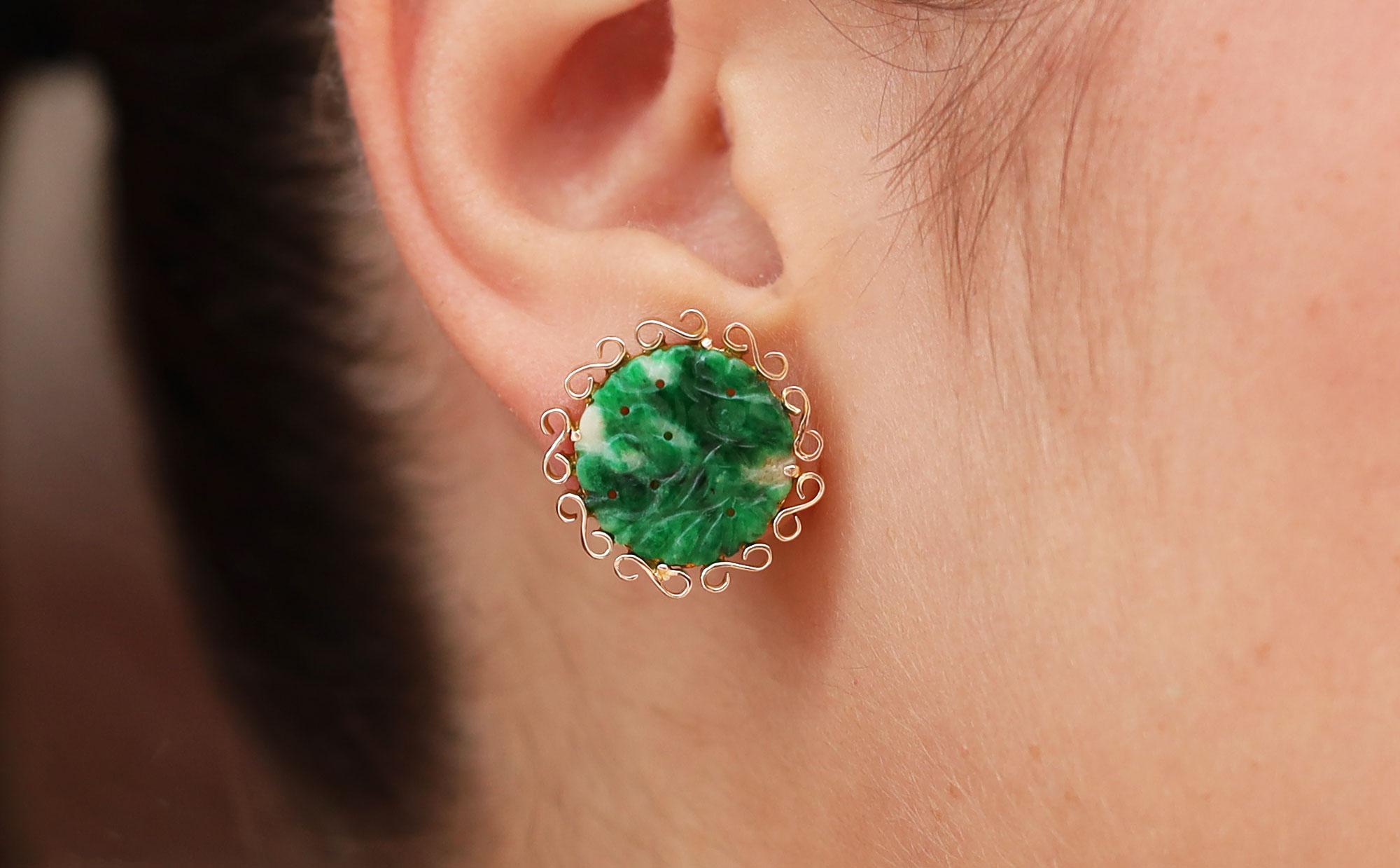 A pair of glowing, carved Imperial Jade discs that were reimagined into a pair of lovely earrings. The vivid and deeply saturated untreated Type A jadeite were once a pair of cufflinks that our master goldsmiths magically transformed into a pair of