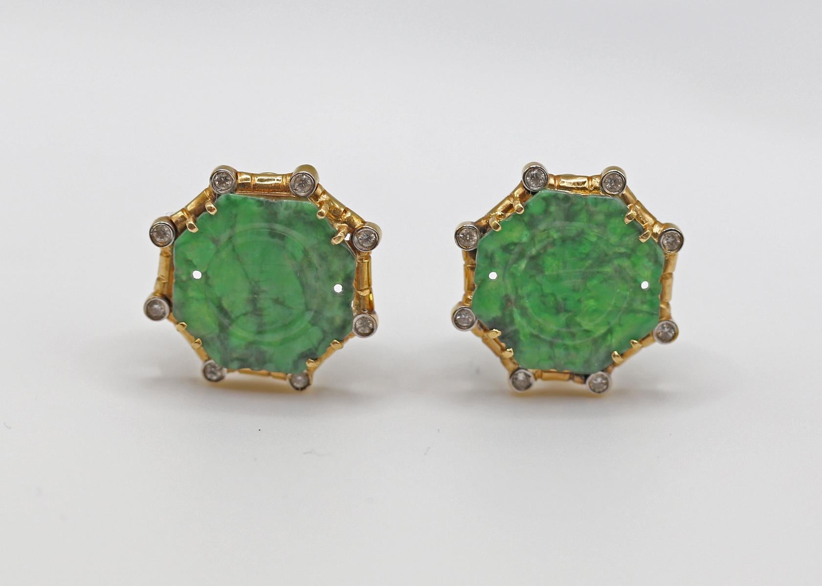 Carved Jade And Diamond Earclips 18K Gold. Created around 1970.
Carved jade and round brilliant cut diamonds, posts with clipbacks. 18 Karats bicolor gold. Fine Jade octagon designs have finely carved Chinese symbols of Good Fortune. 
Jade is set in