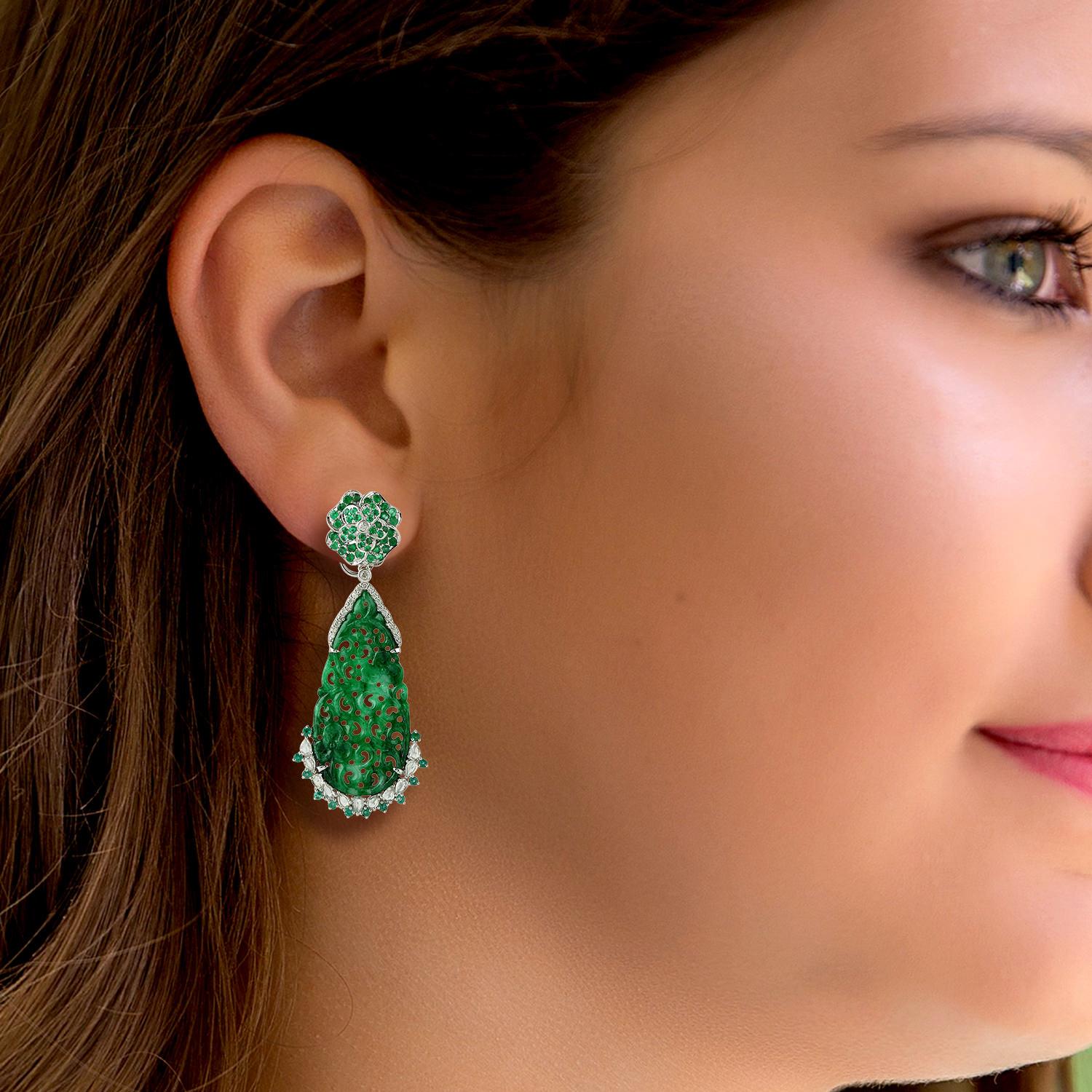 These stunning hand carved Jade earrings are crafted in 18-karat gold. It is set in 20.85 carats Jade, 1.71 carats emerald and .28 carats of sparkling diamonds.

FOLLOW  MEGHNA JEWELS storefront to view the latest collection & exclusive pieces. 