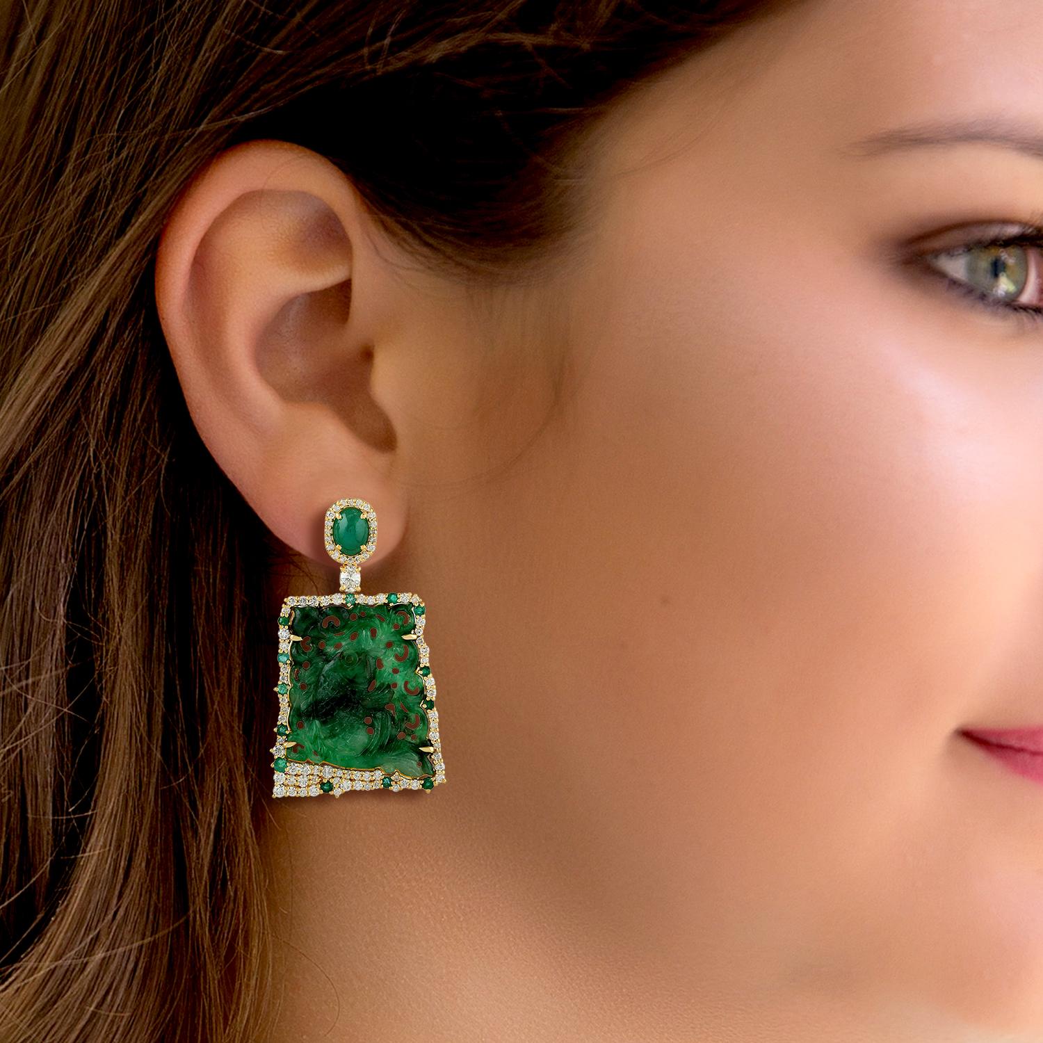 These stunning hand carved Jade earrings are crafted in 18-karat gold. It is set in 24.62 carats Jade, 2.48 carats emerald, 2.31 carats of sparkling diamonds.

FOLLOW  MEGHNA JEWELS storefront to view the latest collection & exclusive pieces. 