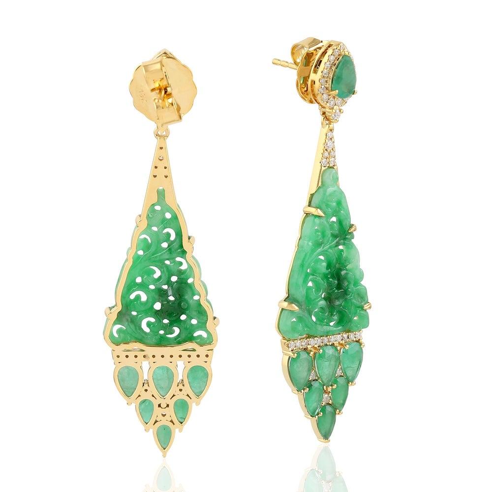 These stunning hand carved Jade earrings are crafted in 18-karat gold. It is set in 13.01 carats Jade, 2.3 carats emerald and .47 carats of sparkling diamonds.

FOLLOW MEGHNA JEWELS storefront to view the latest collection & exclusive pieces. Meghna