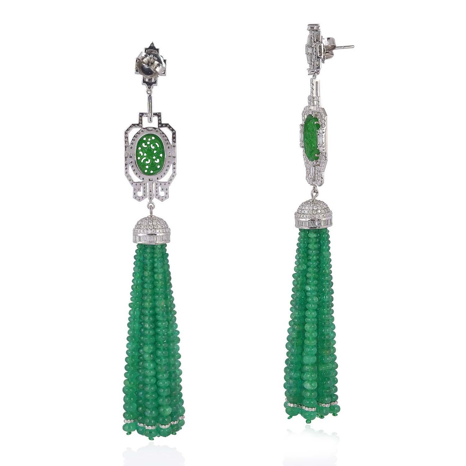 These stunning exceptional tassel earrings is handmade in 18-karat gold.  It is set with 128.1 carats emerald, 4.5 carats Jade and 6.32 carats of glittering diamonds.

FOLLOW  MEGHNA JEWELS storefront to view the latest collection & exclusive