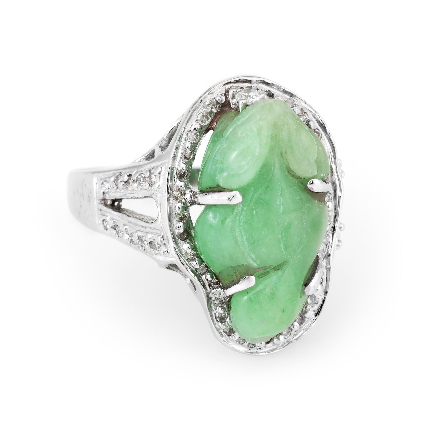 Finely detailed vintage cocktail ring, crafted in 18 karat white gold. 

Jade is carved in the form of a frog measuring 18mm x 11mm, accented with an estimated 0.29 carats of diamonds (estimated at H-I color and SI1-2 clarity). The jade is in