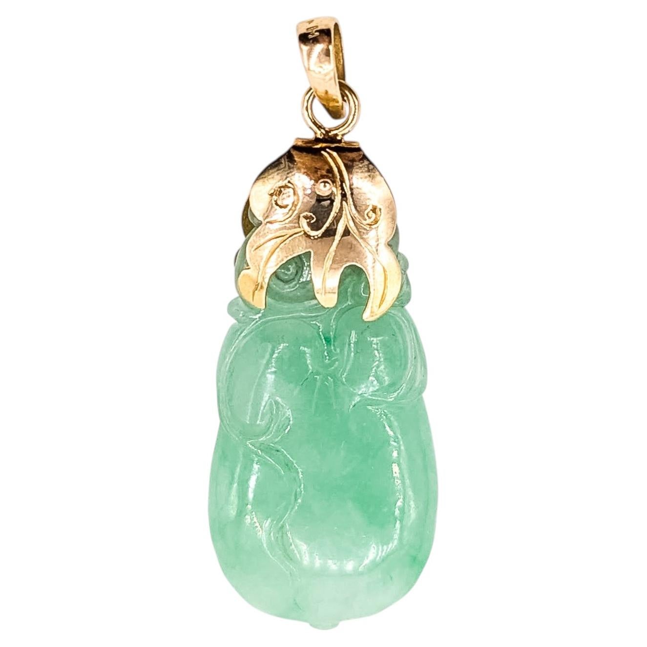 Carved Jade Pendant in 18k Yellow Gold