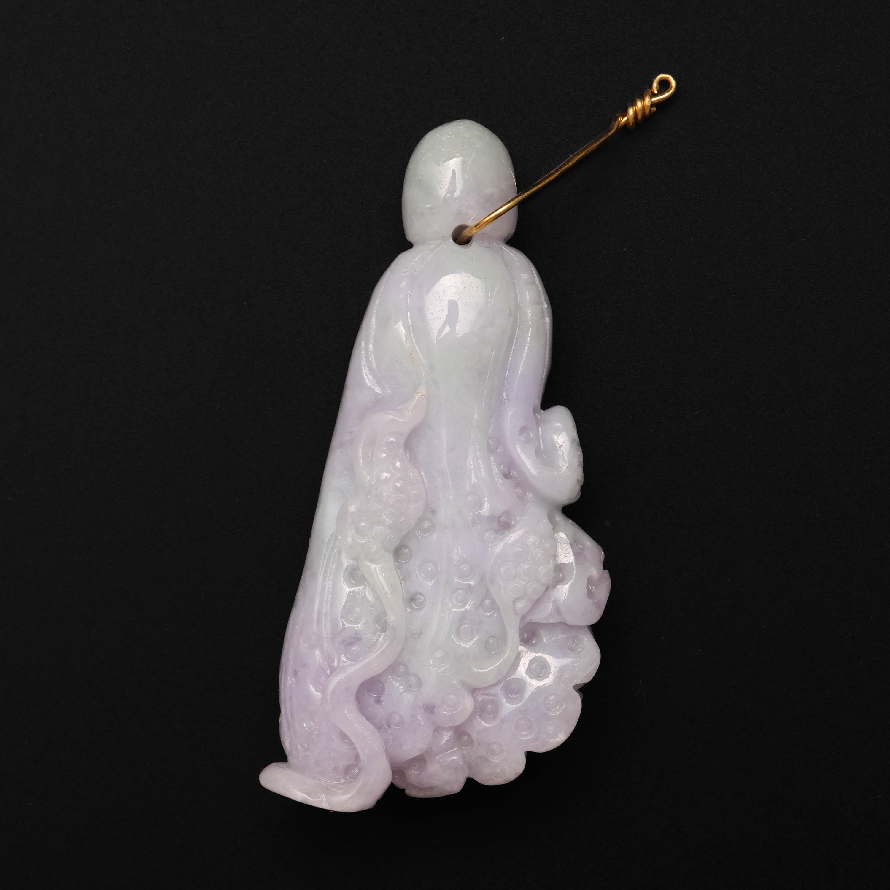 Intricately carved by a master lapidary artist, this natural and untreated Burmese jadeite jade carved pendant depicts a cabbage; long symbolic for purity.

This gorgeous carving was created from a single piece of natural and untreated Burmese