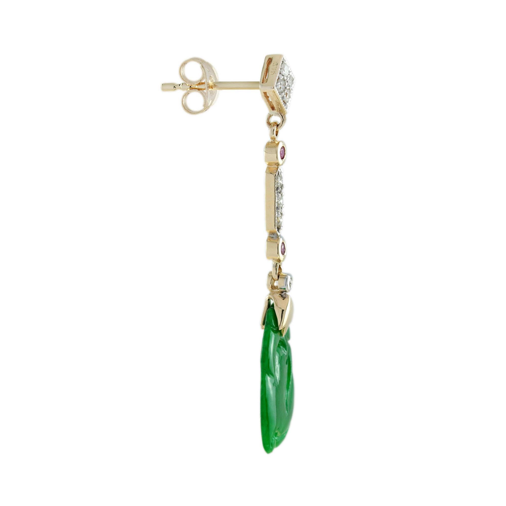 The natural jade in these lovely earrings has some very special shape. Both pieces have a strong green color and well carvings. The jade is suspended in a 9k yellow gold setting with ruby and diamond link on the top. The earrings transfer their good