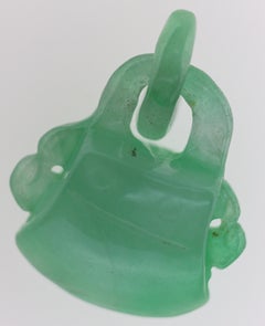 Carved Jadeite Lock Pendant
