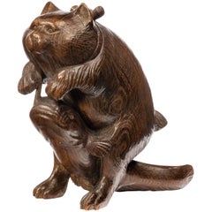 Carved Japanese Figure of a Cat Playing with a Dogfish