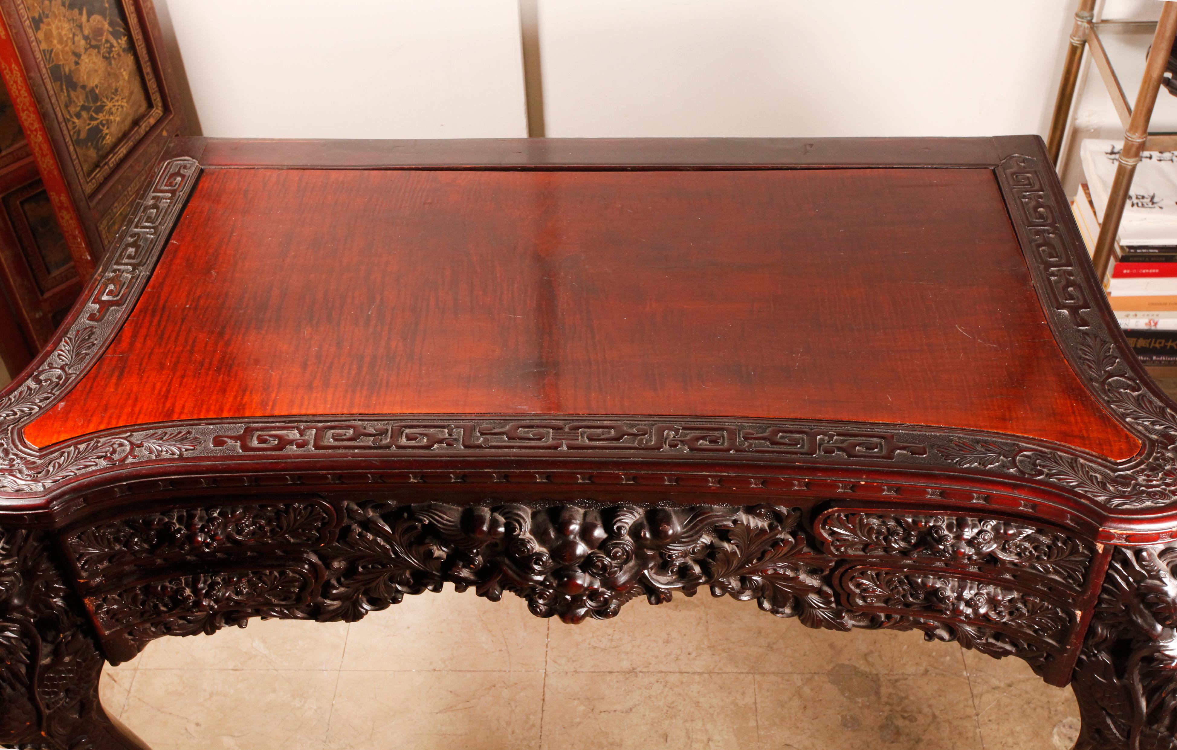 carved with lion masks and leaf foliage 