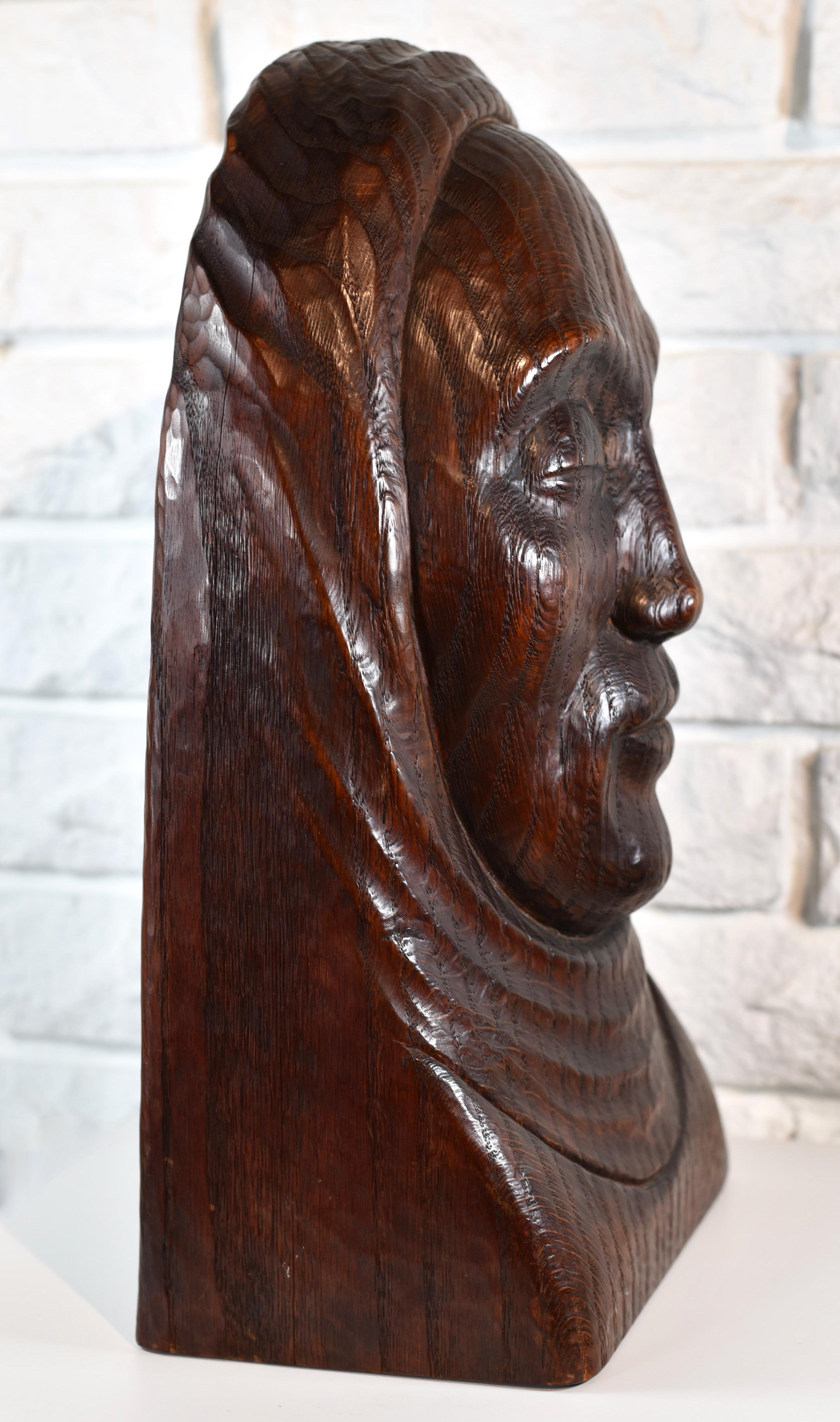 SIgned to the rear and dated 1942.

In 1933 Rood started wood carving in Athens, Ohio and it wasn't long before he had his first one-person exhibit at Argent Galleries, in New York in 1937. His style began with a large bulky folk style and themes of