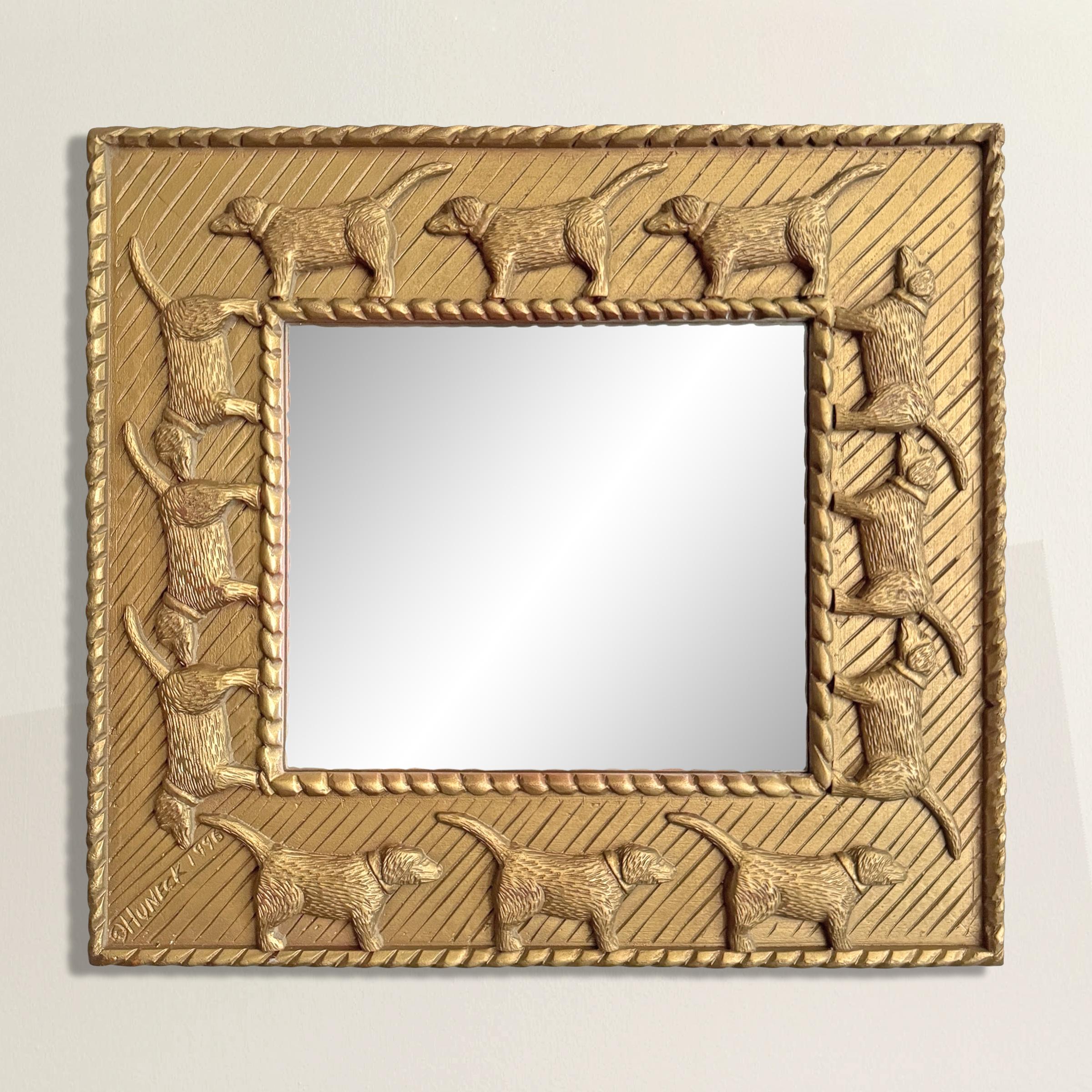 A mirror that’s less about reflection and more about devotion. This American folk art frame, carved and painted by Stephen Huneck in 1996, wraps the glass in an endless procession of Labrador Retrievers—his most beloved muse. Set against hand-carved