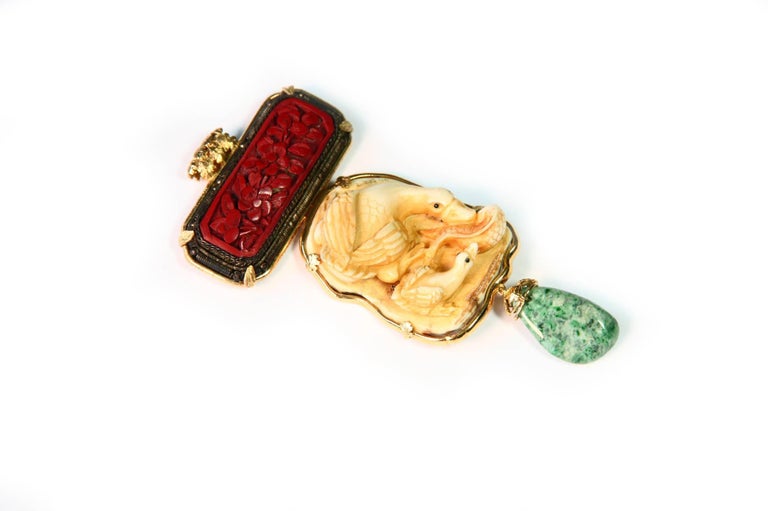 Antiques Japanies netsuke  signed with goose, little puppy with a fish, carved enamel antiques Chinese lacquer 1920, amazzonite drop. Very refined decoration gold with little leaf of oak. Total length 9 cm. 18kt Gold 20gr.
All jewelry is new and has
