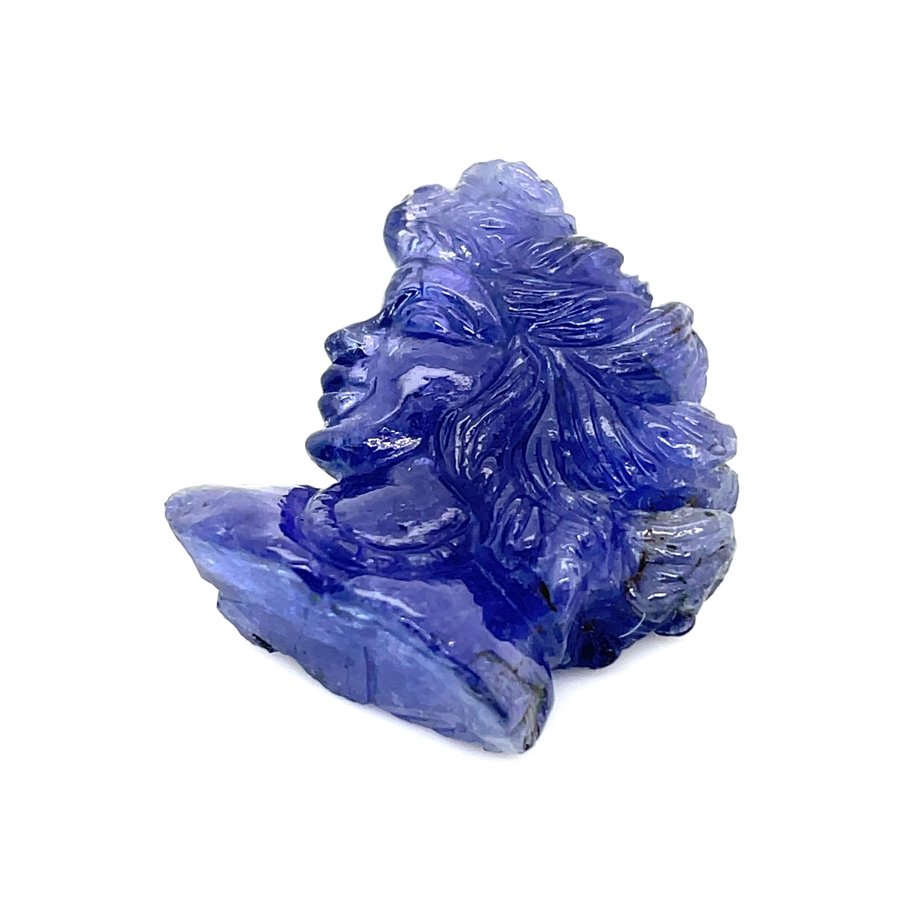 This breathtaking Carved Lady Tanzanite, a stunning gemstone weighing 49.76 cts, is adorned with intricate detailing that brings a graceful lady to life.

Everything about this gorgeous stone, from the strands of hair and delicate face to the