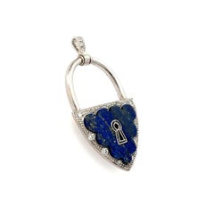 Carved Lapis Lazuli and OEC Diamond Platinum Open Lock Pendant