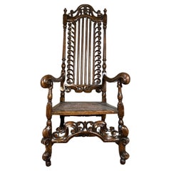 Carved late 17th century style high back armchair