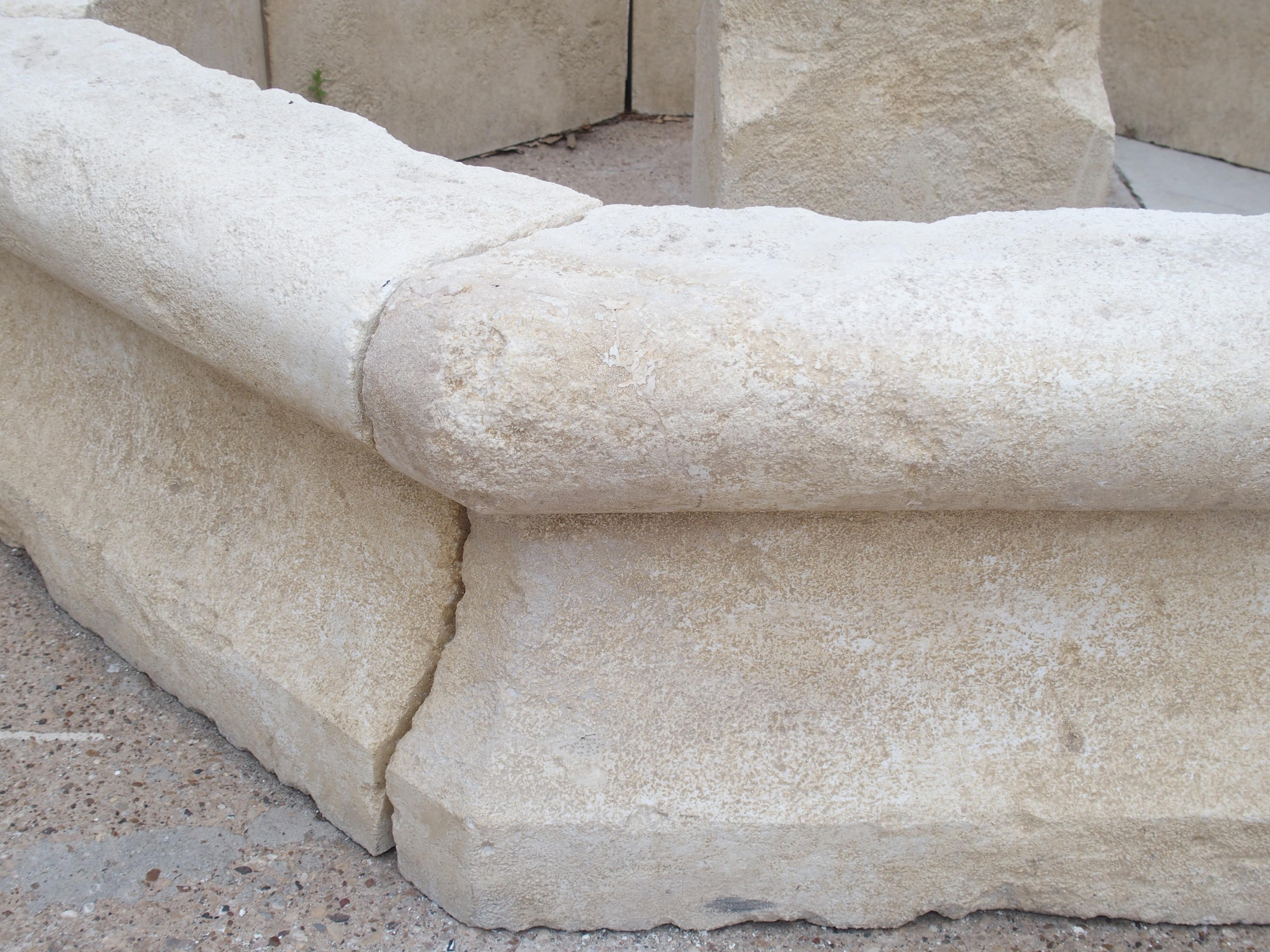 This hand carved limestone, center fountain from France is octagonal and has well shaped basin stones instead of flat. It has four iron spouts that adorn the center post. Traditionally found in the villages throughout the ages in France, today, they