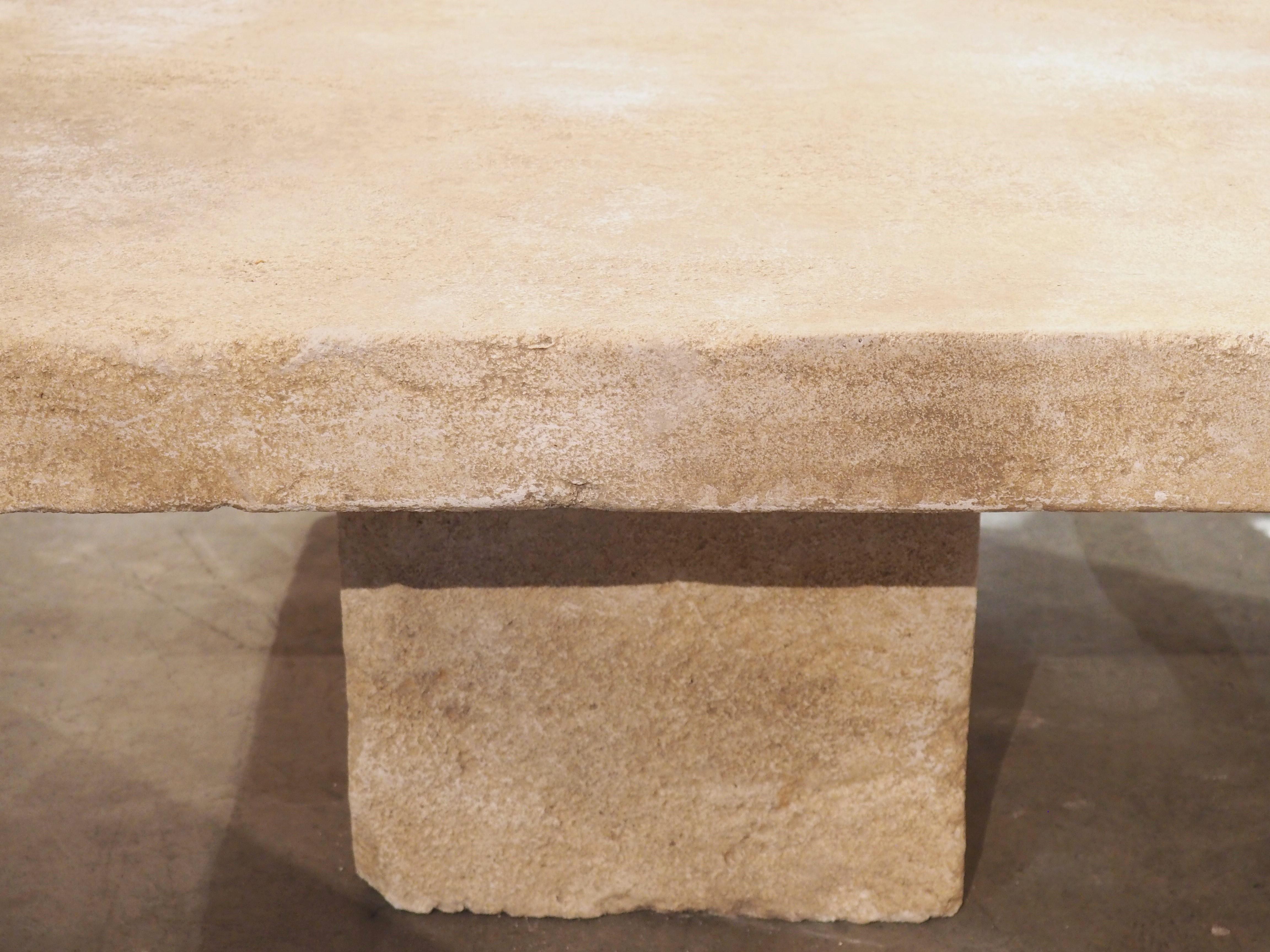 This versatile coffee table from the South of France has been hand-carved from the famous Estaillade stone of Provence. The top is one large piece of limestone (3 3/4 inches thick), while the base is made from a separate block. This table can be