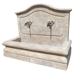 Carved Limestone Double Fleur De Lys Wall Fountain from the South of France