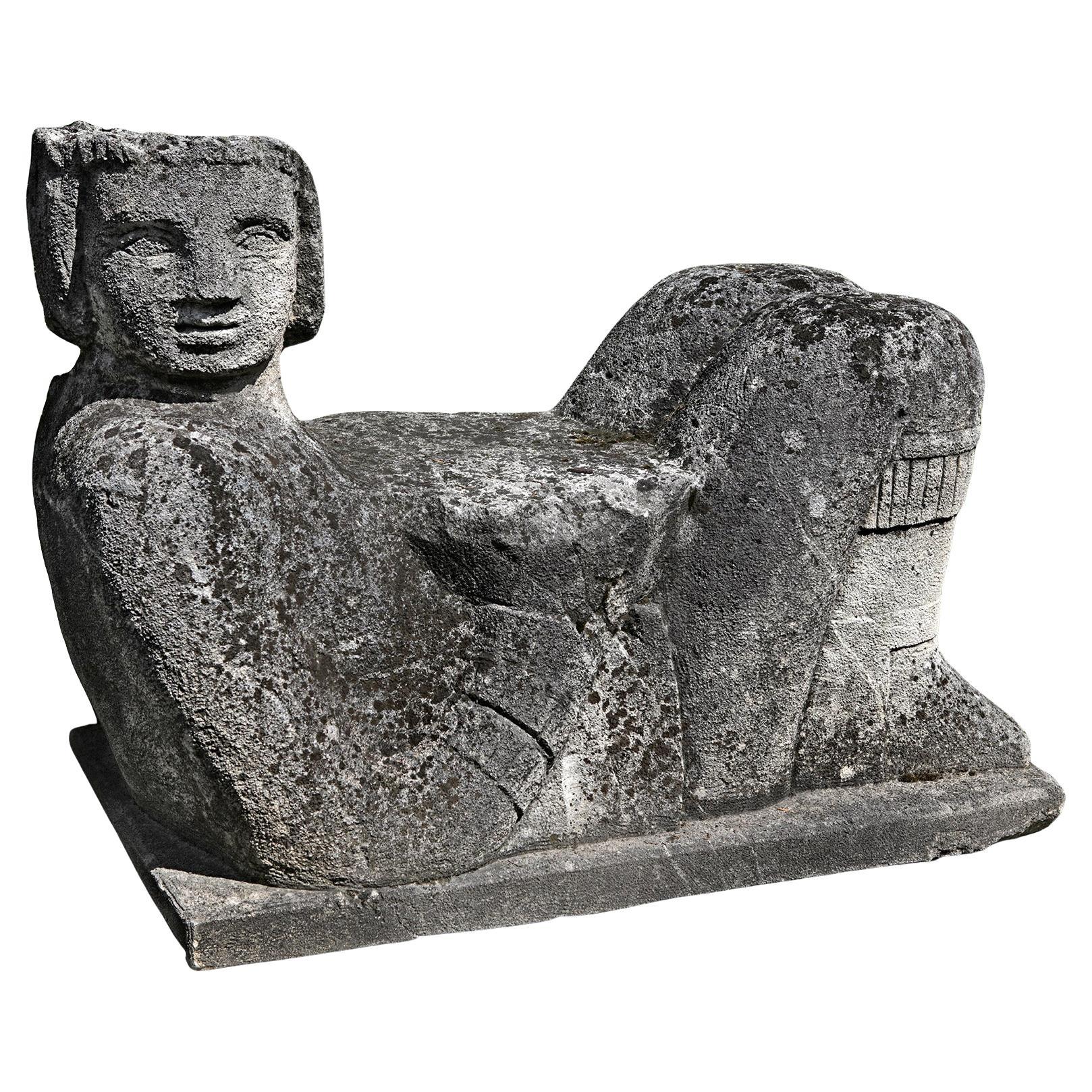 Carved limestone garden seat in Mesoamerican style
