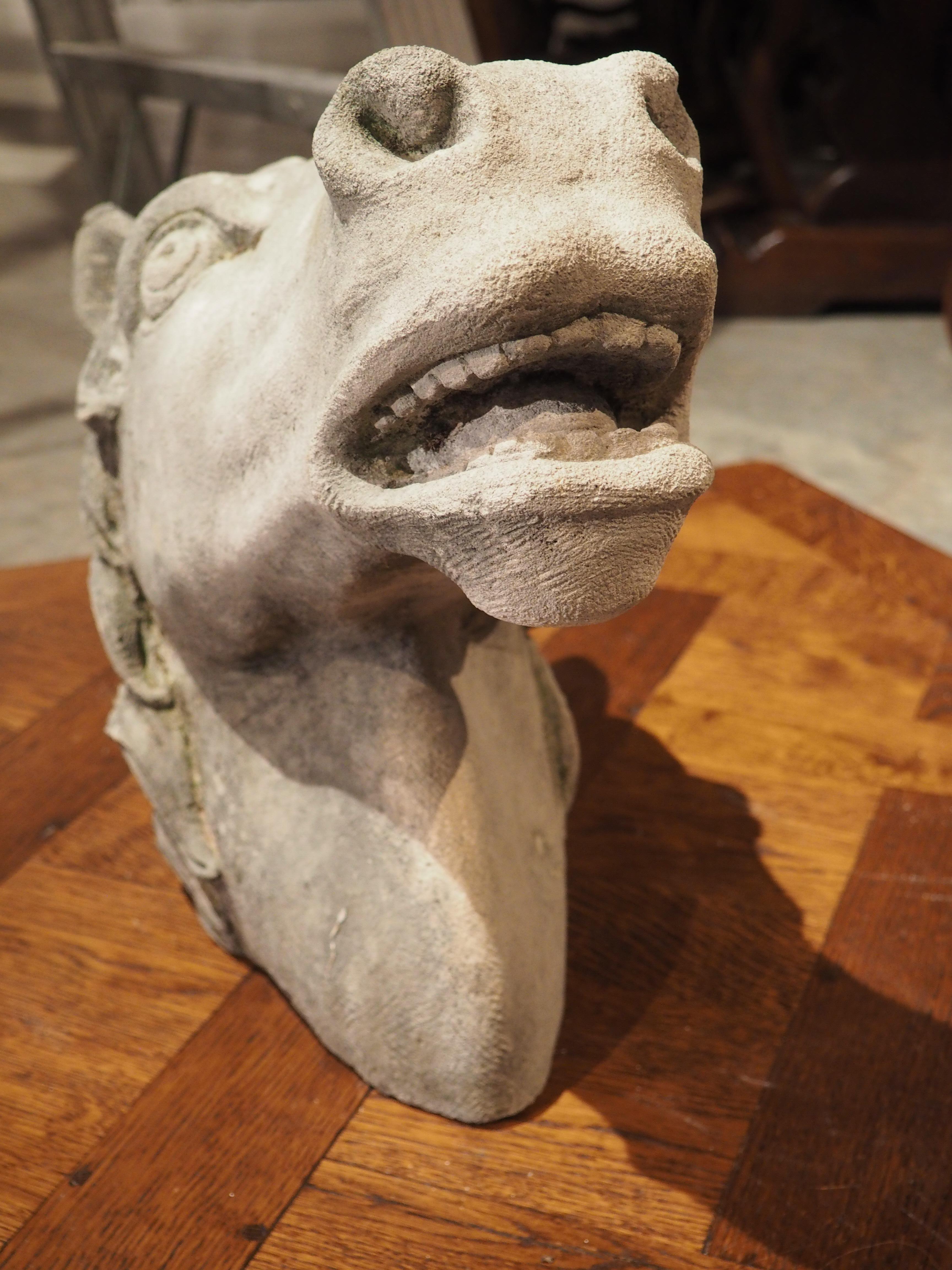 Hand-carved by an Italian stone mason, this quaint limestone horsehead has excellent proportions. The contour of the cheek, the thick mane, and the slightly open mouth give the head a sense of realism. Carved with amazing precision, the horse can