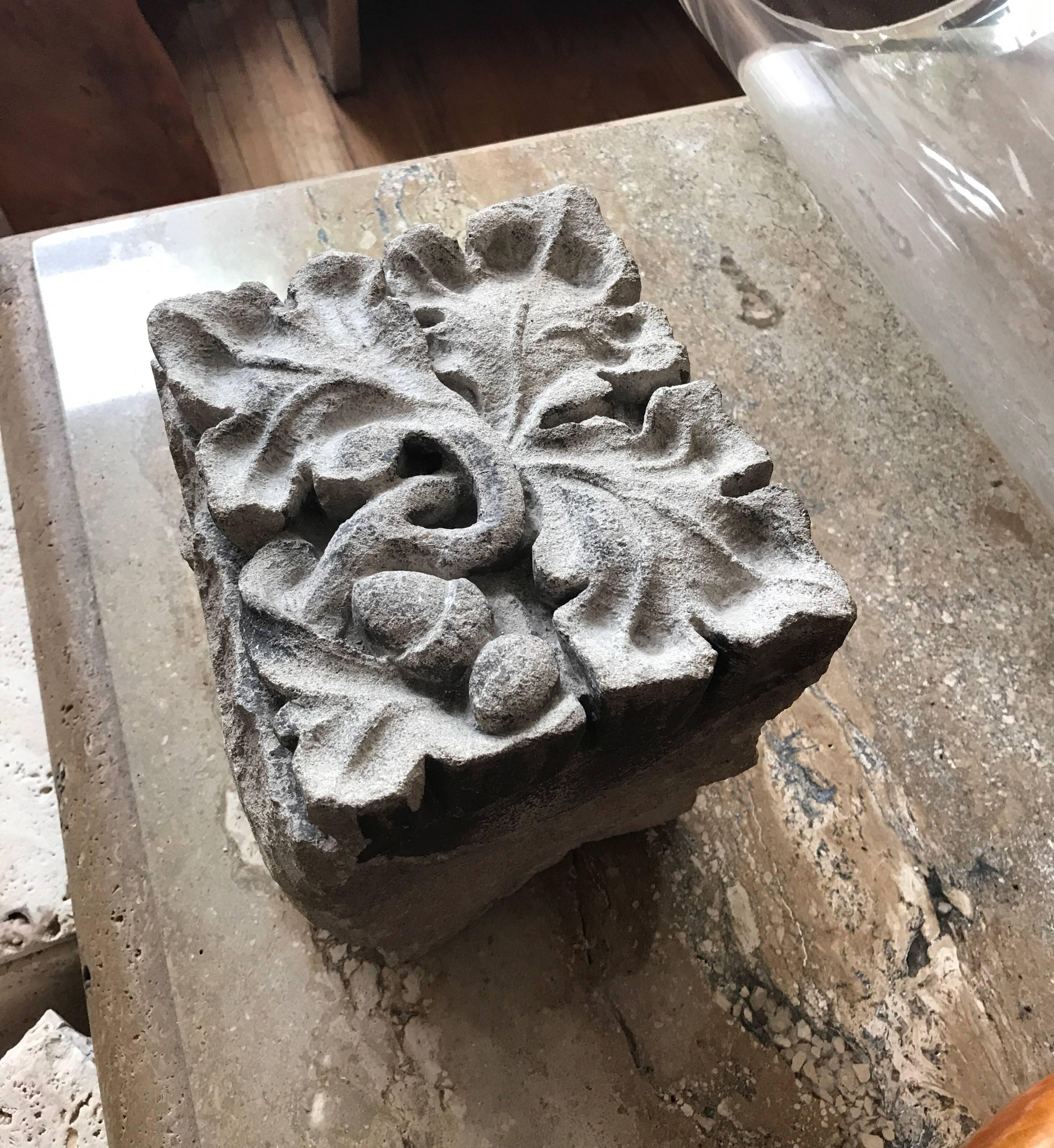 A highly versatile small carved limestone architectural fragment featuring with oak leaves and acorns in high relief. 
Because of its small size this architectural fragment from a Chicago building could be used indoors or outdoors as a decorative