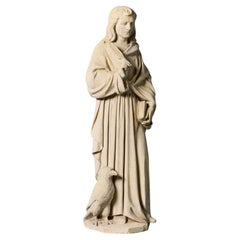 Estatua antigua de piedra caliza tallada de un erudito