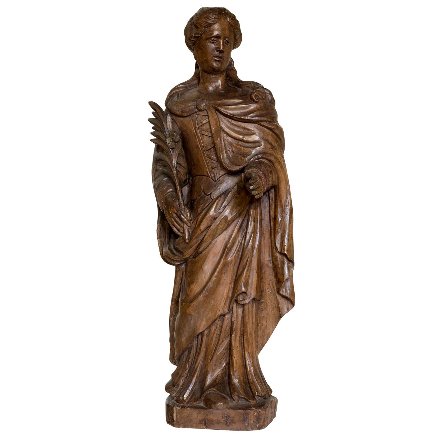 Carved Limewood Figure of St Catherine of Alexandria, 17th Century For Sale