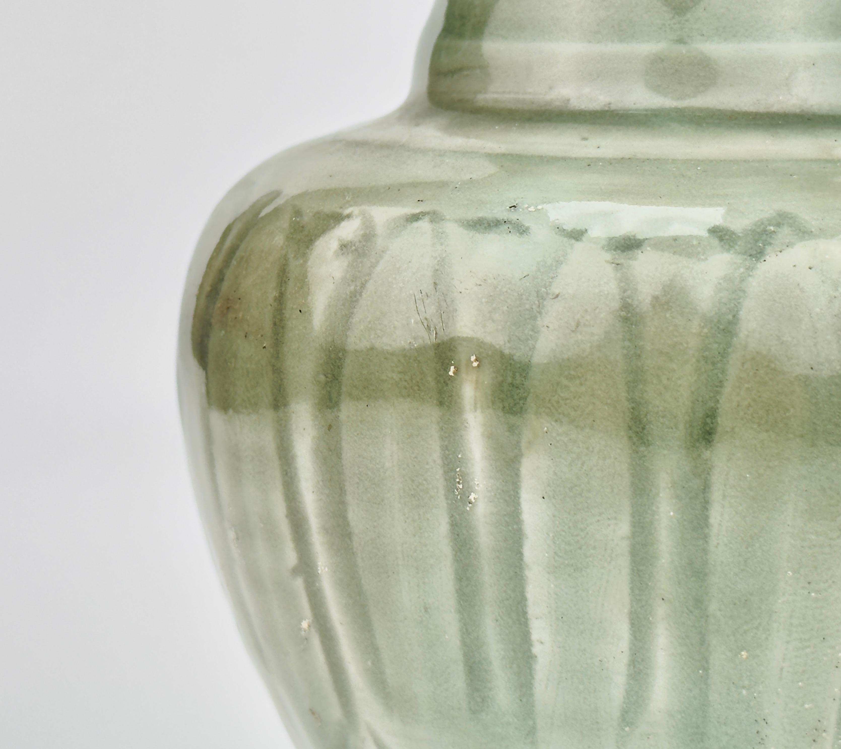 Carved 'Longquan' Celadon-glazed Funerary vase and cover, Song dynasty For Sale 1