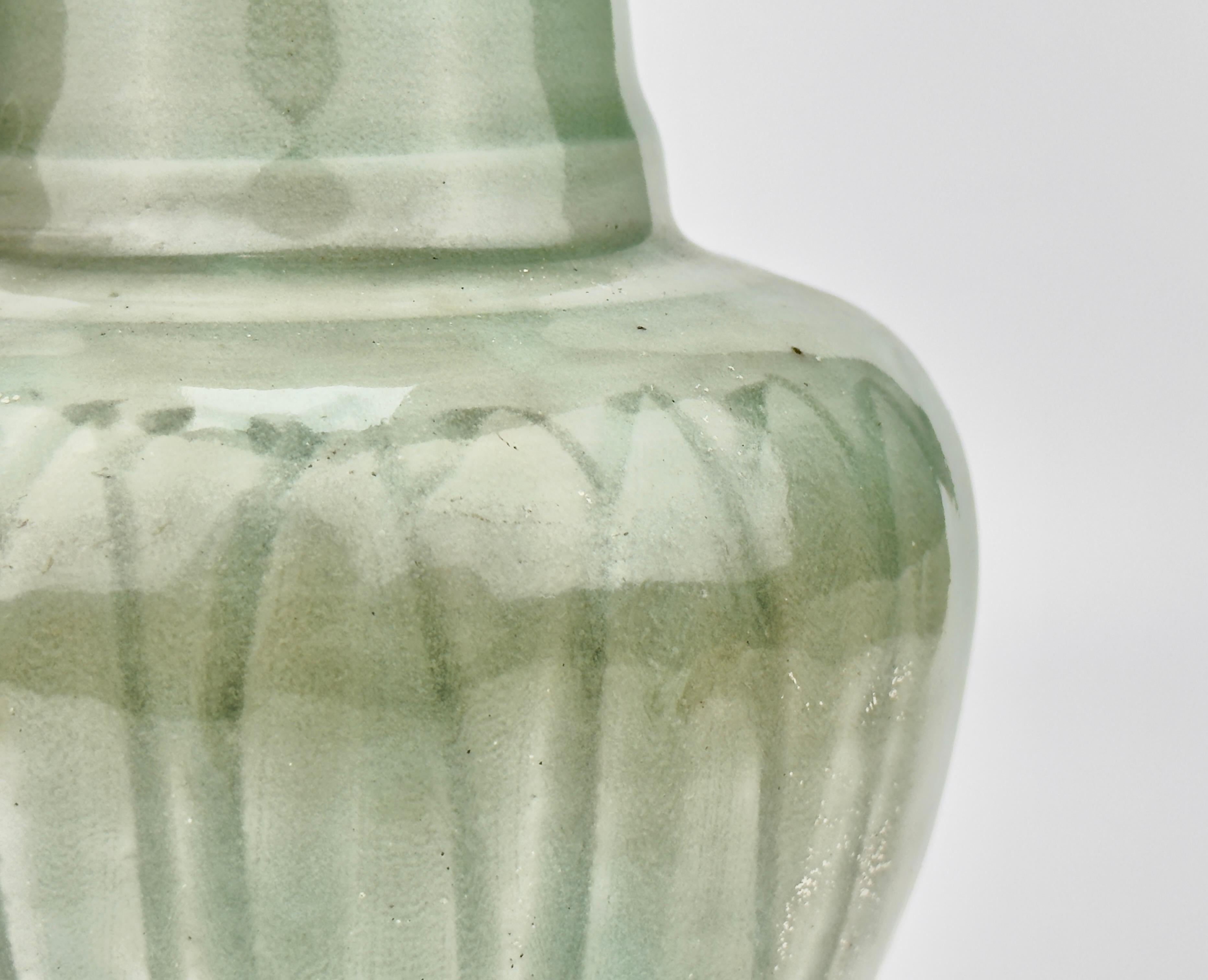 Carved 'Longquan' Celadon-glazed Funerary vase and cover, Song dynasty For Sale 2
