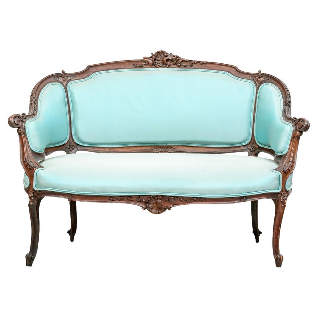 Petite banquette sculptée de style Louis XVI à restaurer