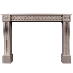Carved Louis XVI Style Limestone Fireplace