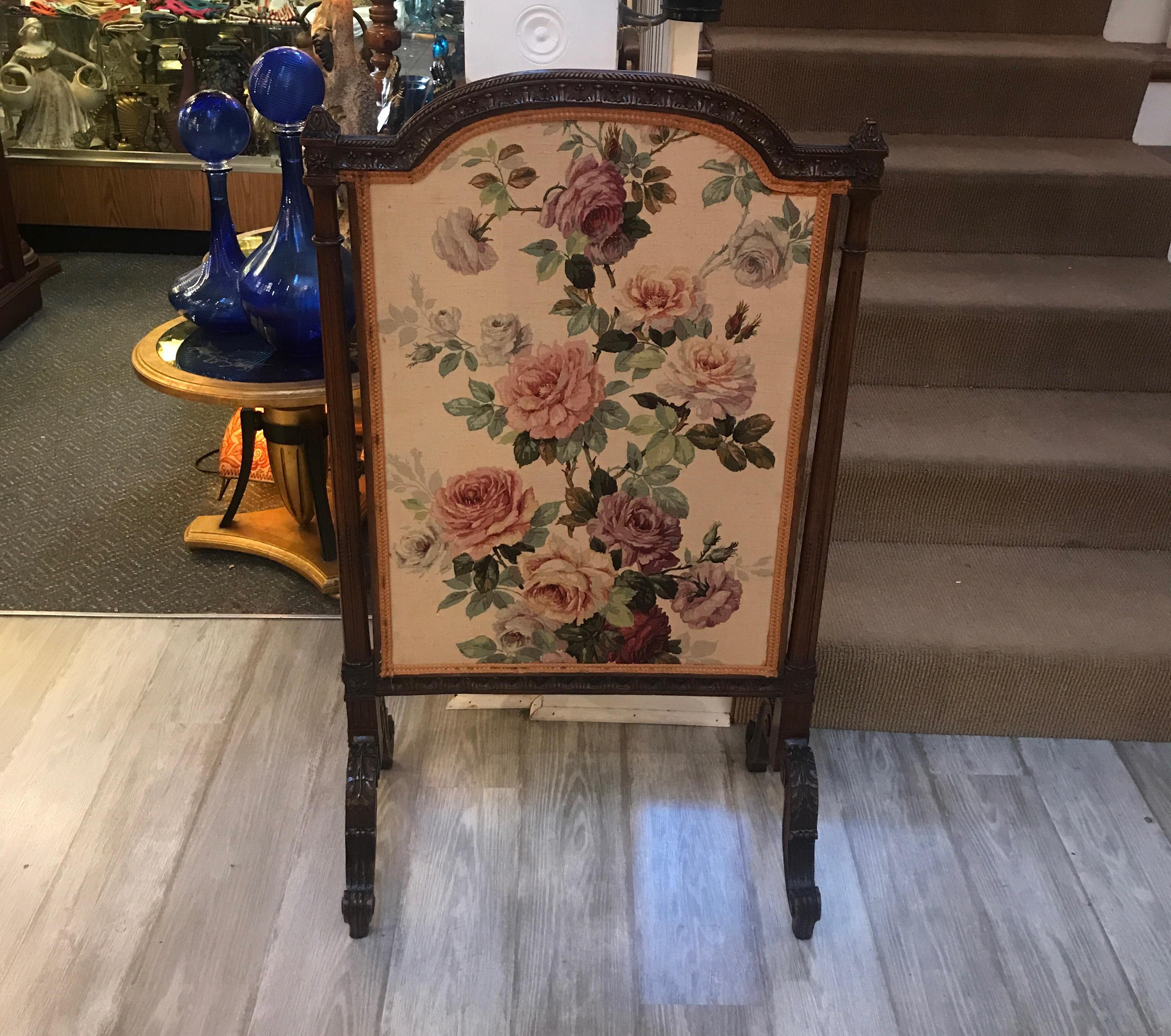Antique Hand carved mahogany frame with floral lined upholstered interior. Grace and elegance for the fireplace when not in use.  Message us for a shipping quote as this can be boxed and shipped FedEx or UPS...
