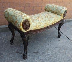 Carved Mahogany and Upholstered Rolled Arms Bench