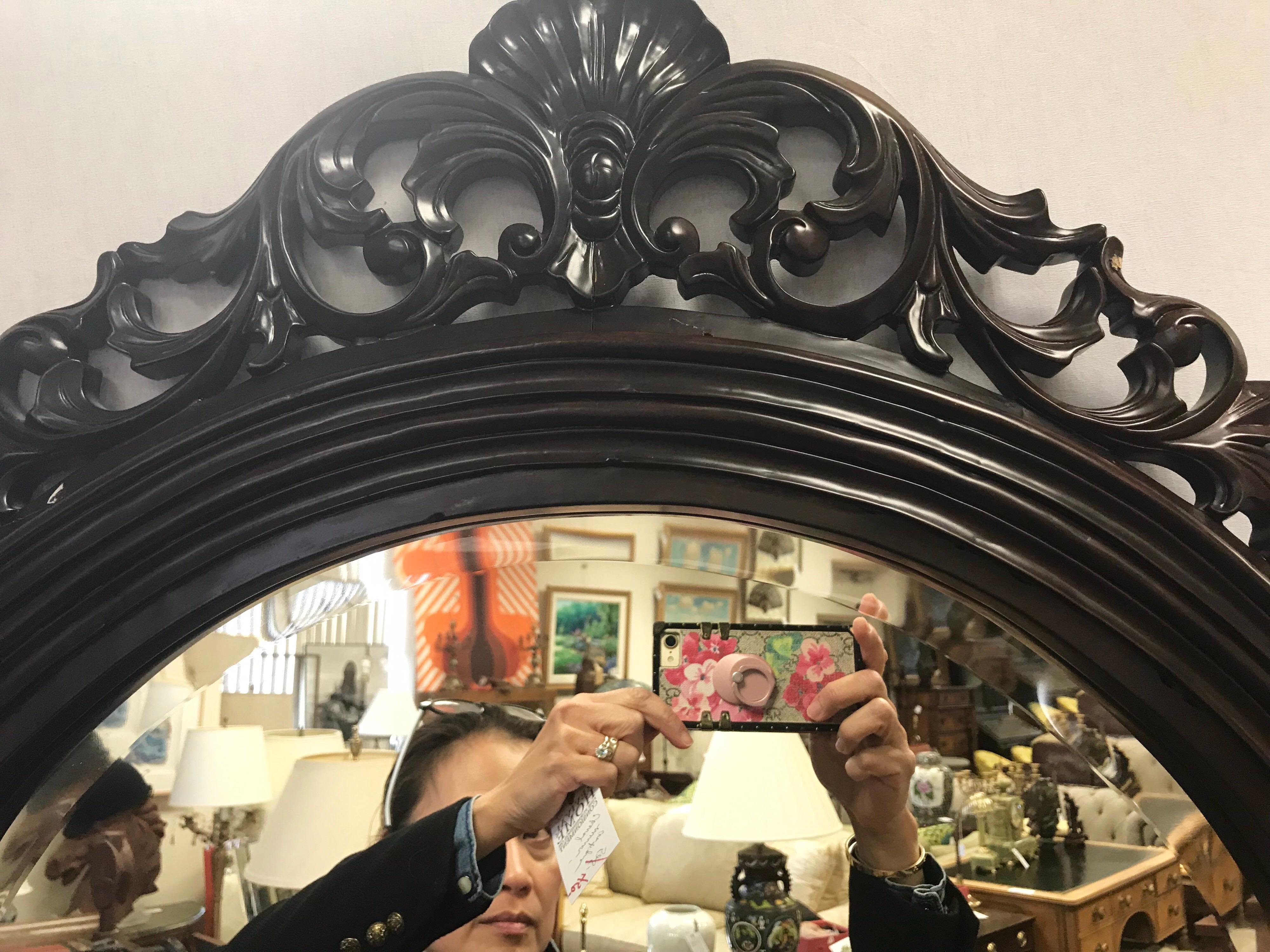 Antique large quality Regency reproduction carved mahogany cheval mirror. Glass is beveled.