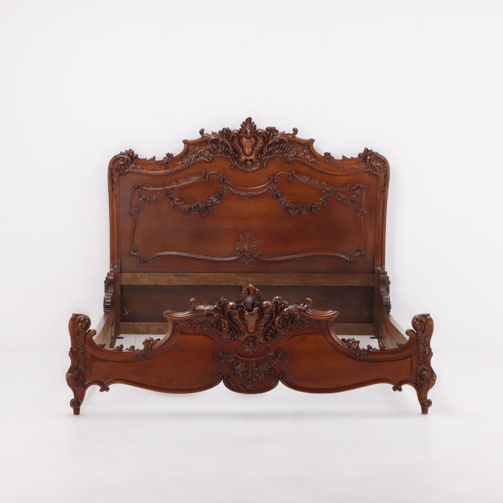 Carved Mahogany French Louis XV style queen size bed C 1900. This is the bed you have been looking for but have not been able to find! The reason is that there were not very many made in queen size. In forty years of business we have only had a