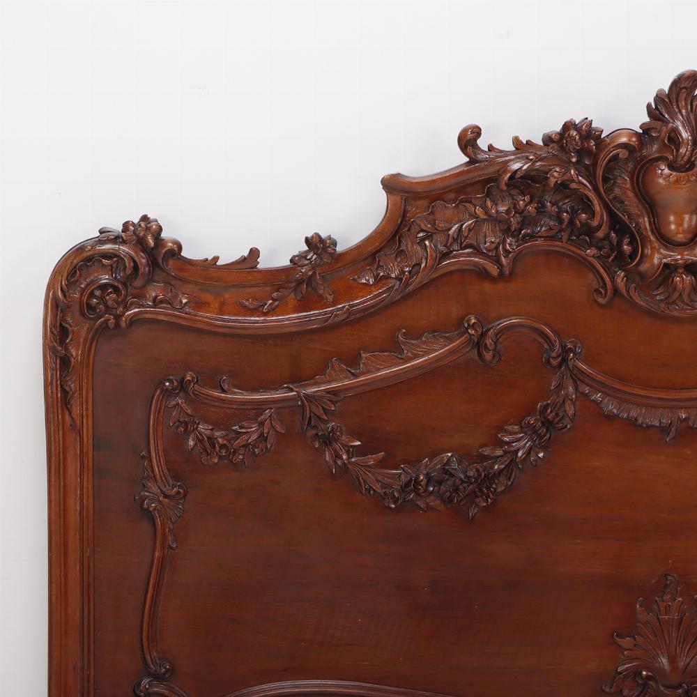 Early 20th Century Carved Mahogany French Louis XV style queen size bed C 1900. For Sale