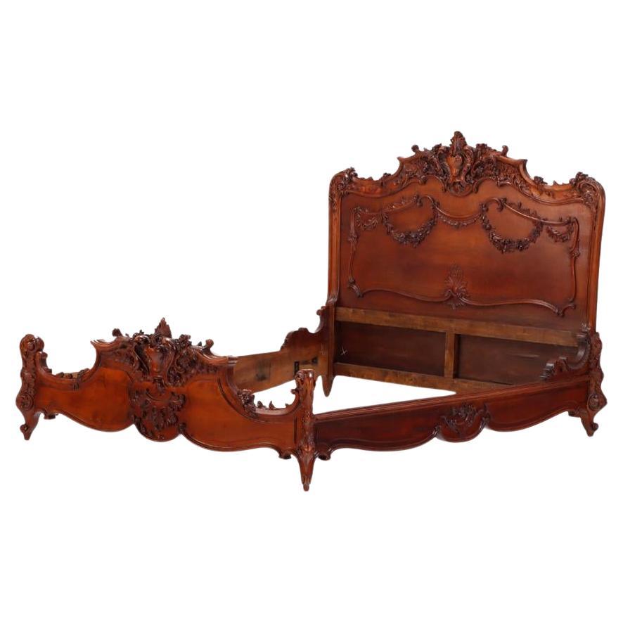 Carved Mahogany French Louis XV style queen size bed C 1900. For Sale