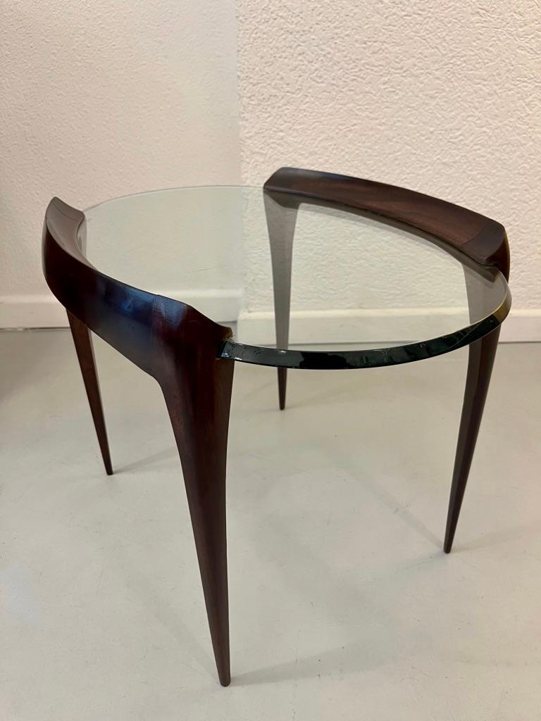 Beveled crystal glass top and carved mahogany legs side table by Max Ingrand produced by Fontana Arte, Italy ca. 1952
Good vintage condition. 
L 54.5 x D 41.5 x H 41.5 cm
Literature  :  Franco Deboni, Fontana Arte, page 404