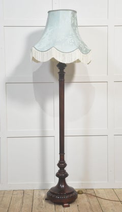 Carved mahogany standard lamp