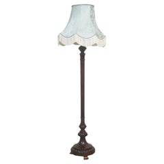 Carved mahogany standard lamp