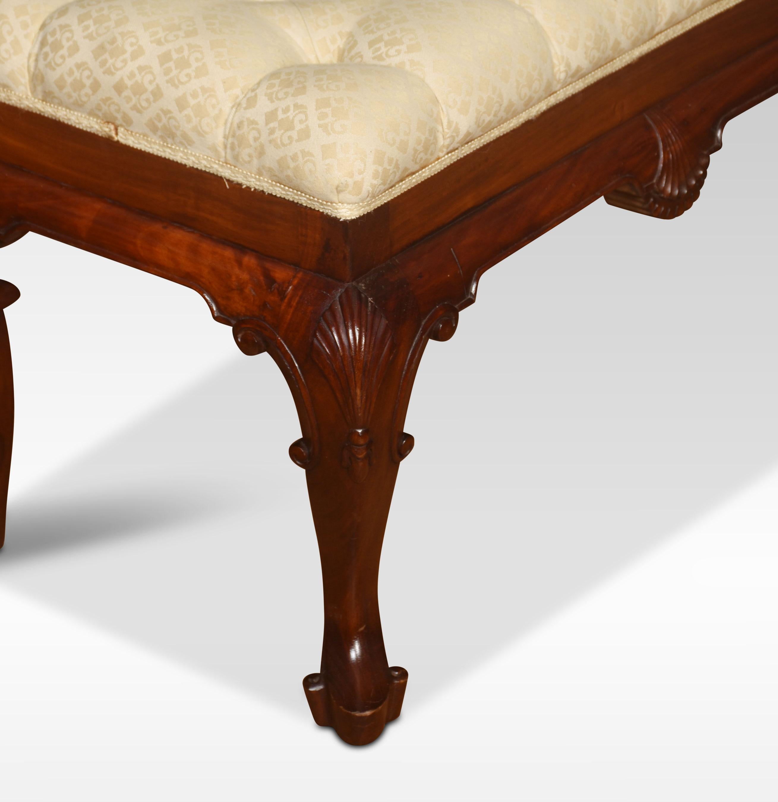 Carved mahogany stool, the deep buttoned upholstered seat. Raised up on four finely carved cabriole legs terminating in scroll toes.
Dimensions
Height 18.5 Inches
Width 28.5 Inches
Depth 17 Inches.