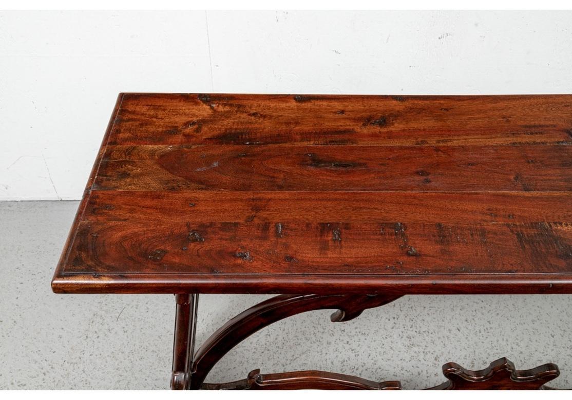 Carved Mahogany Trestle Console Table In Spanish Colonial Style  In Good Condition In Bridgeport, CT