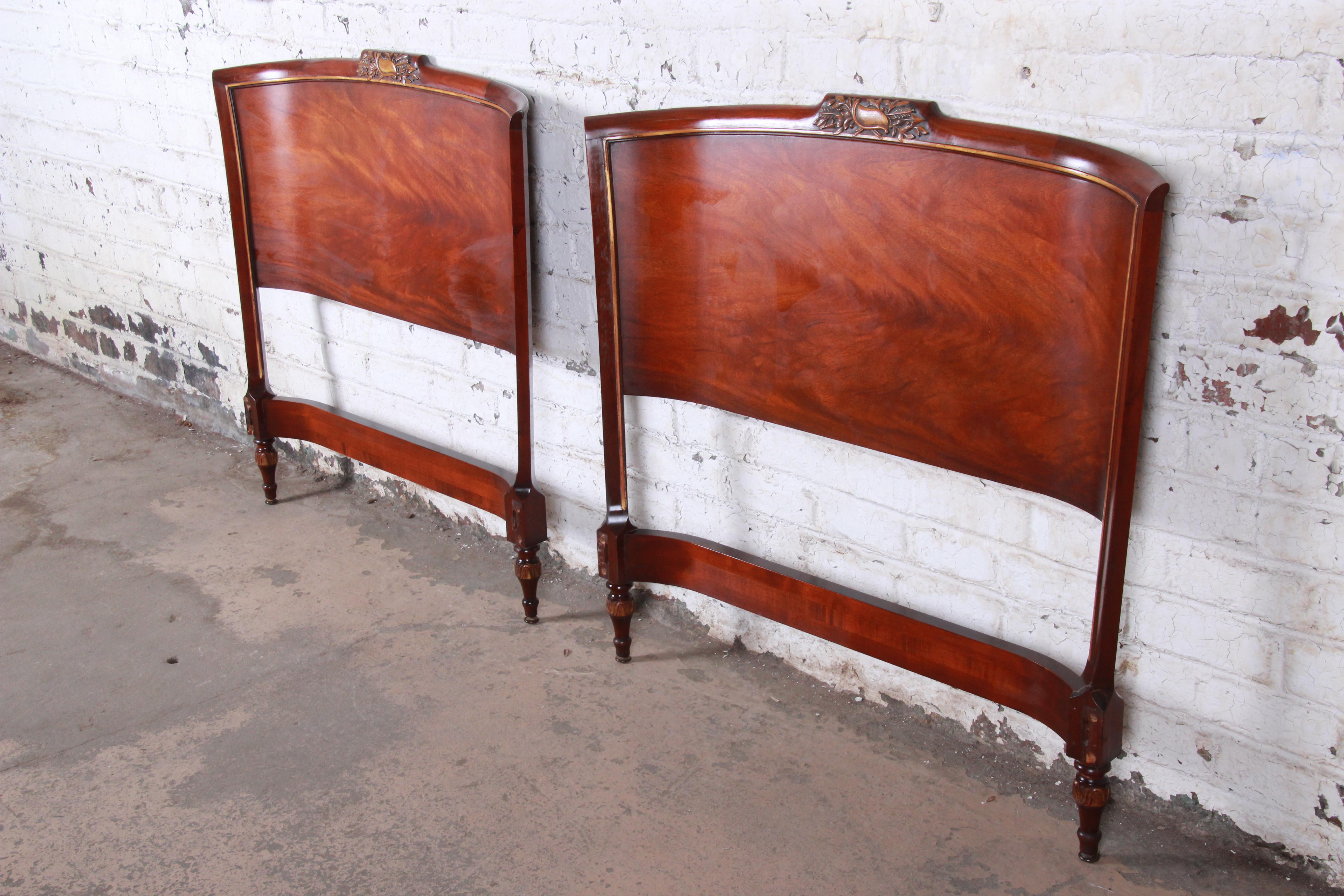 A gorgeous pair of carved mahogany twin headboards

By Irwin Furniture Co.

USA, circa 1940s

Measures: 42.13