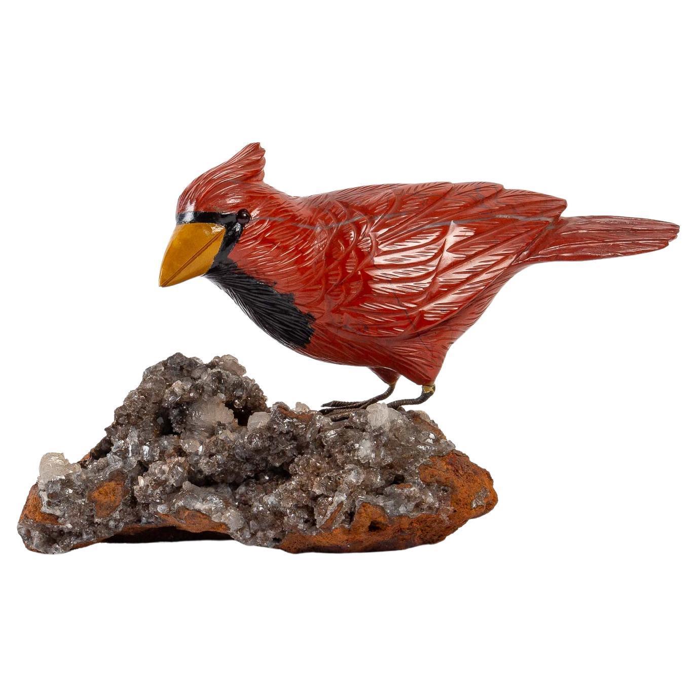 Carved marble bird resting on a rock with rough crystals, 20th century.
Measures: H: 12 cm, W: 19 cm, D: 9 cm.