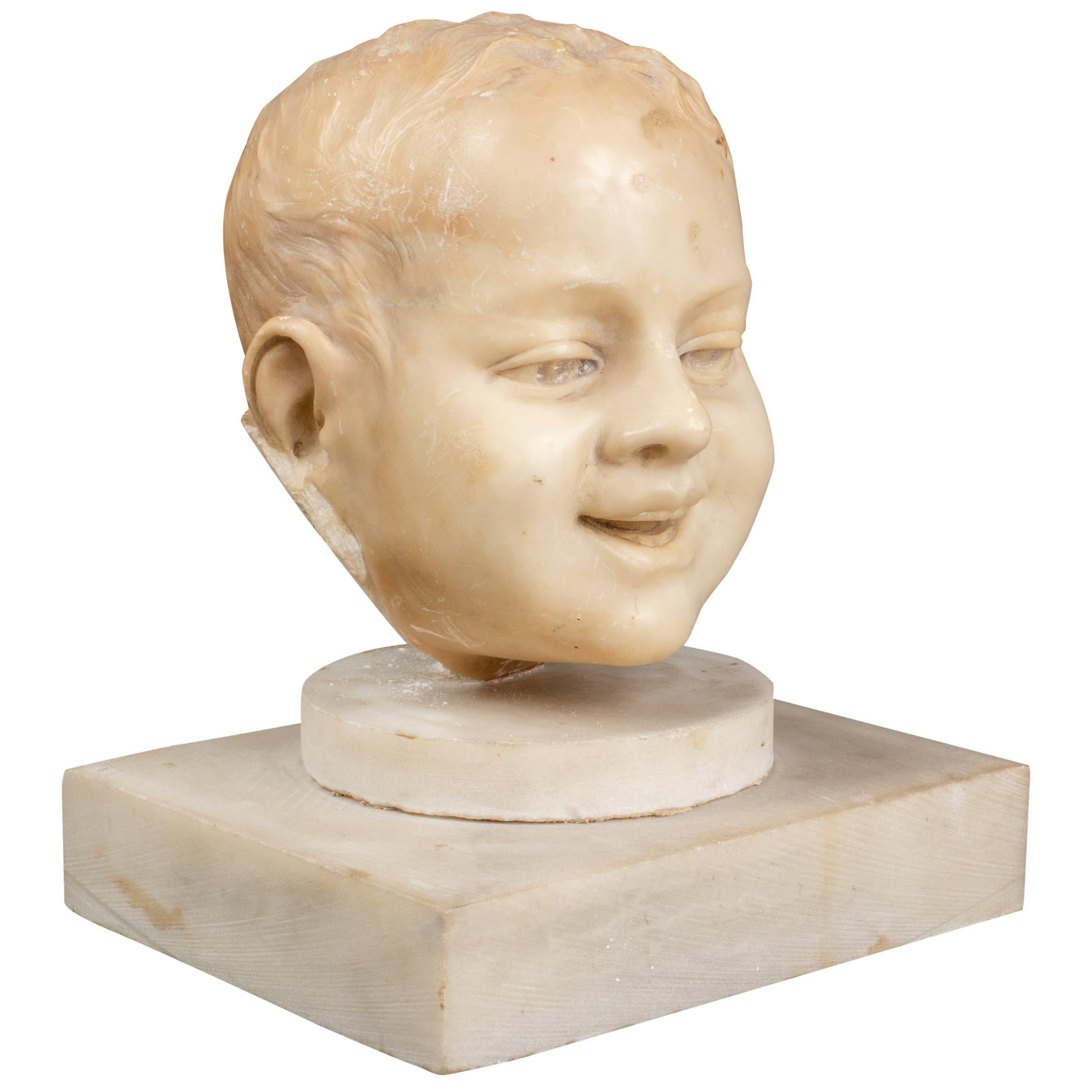 Carved Marble Fragment of a Young Boy For Sale