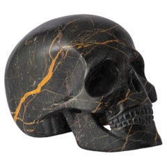Carved Marble Skull in Golden Portoro