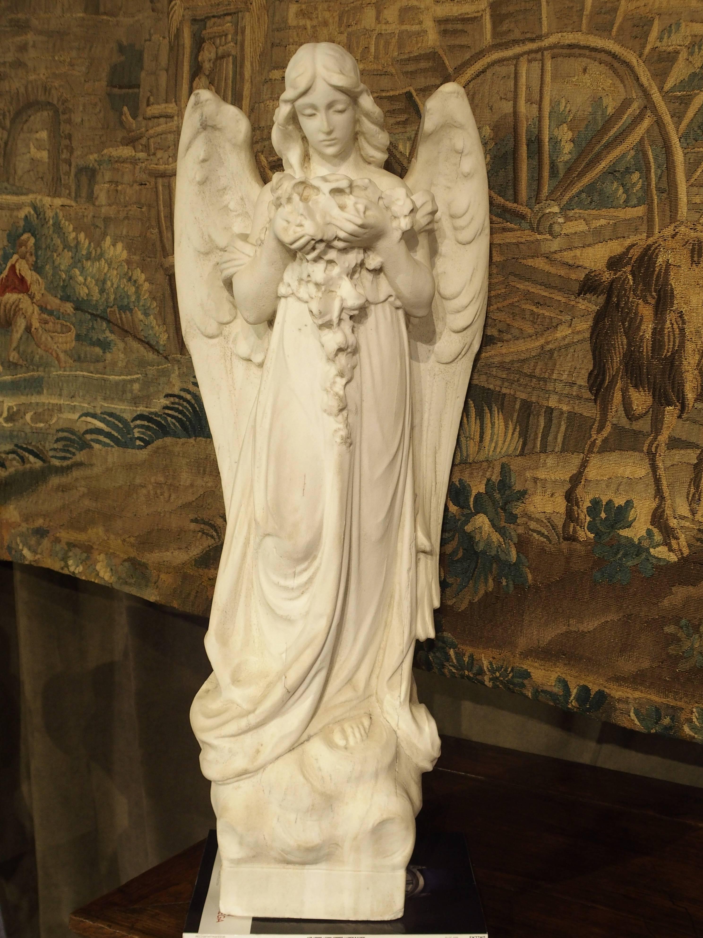 Carved Marble Statue of an Angel Holding a Bouquet 2