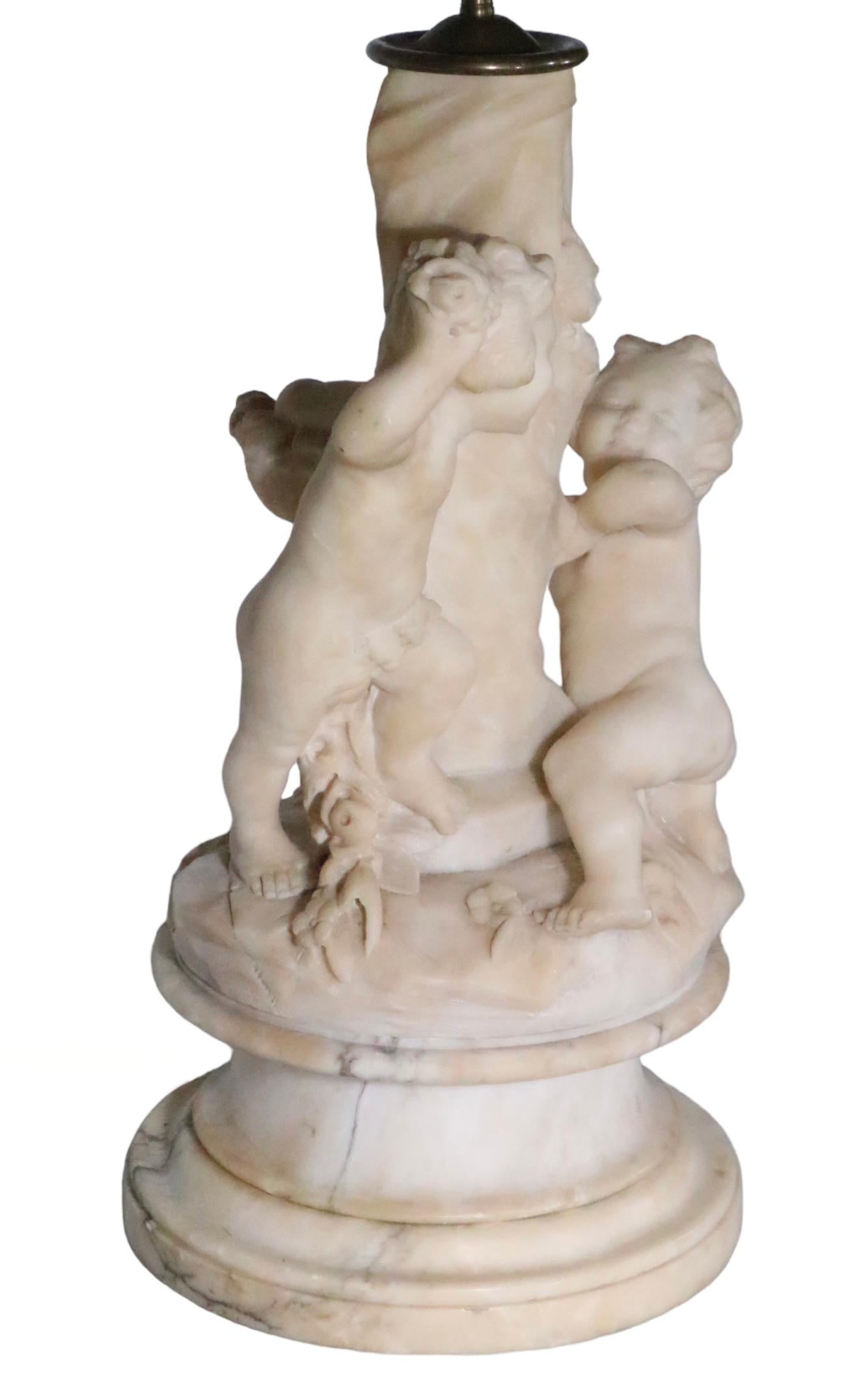 Carved Marble Table Lamp with Cupid Figures Made in Italy signed Corsi  In Good Condition For Sale In New York, NY