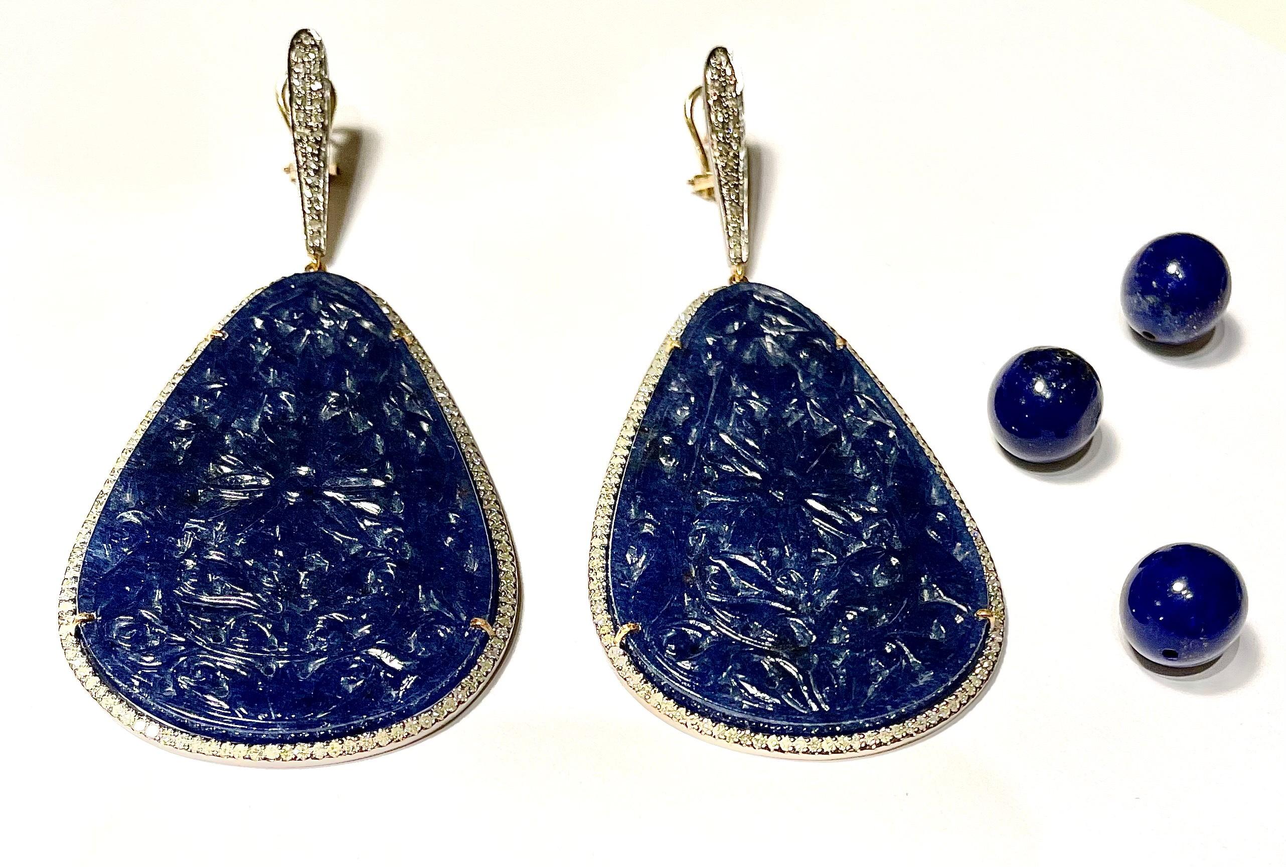 Description
Dramatic hand-carved large Midnight Blue Onyx and pave diamond earrings featuring easy to use Omega backs.
Item # E3256

Materials and Weight
Blue Onyx, 40 x 61mm, pear shape, 105 carats.
Pave diamonds, 3.02 carats.
Posts with omega